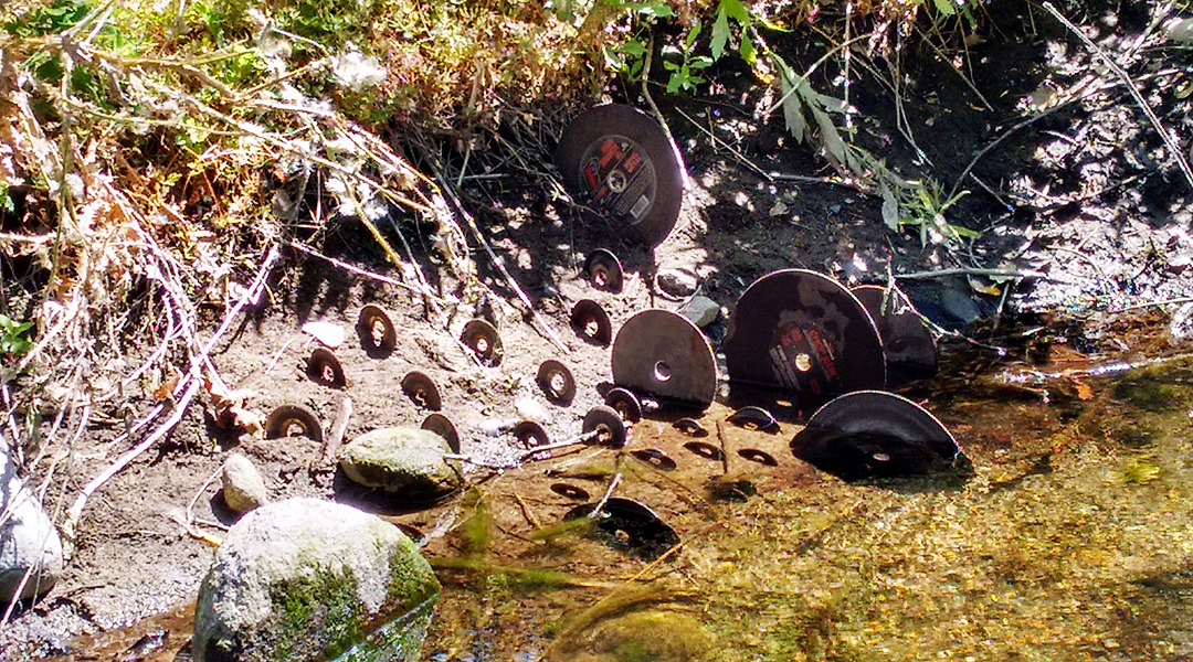 installation of "chop wheels" on the bank of a finger of the south fork of the Kaweah River in Three Rivers, CA