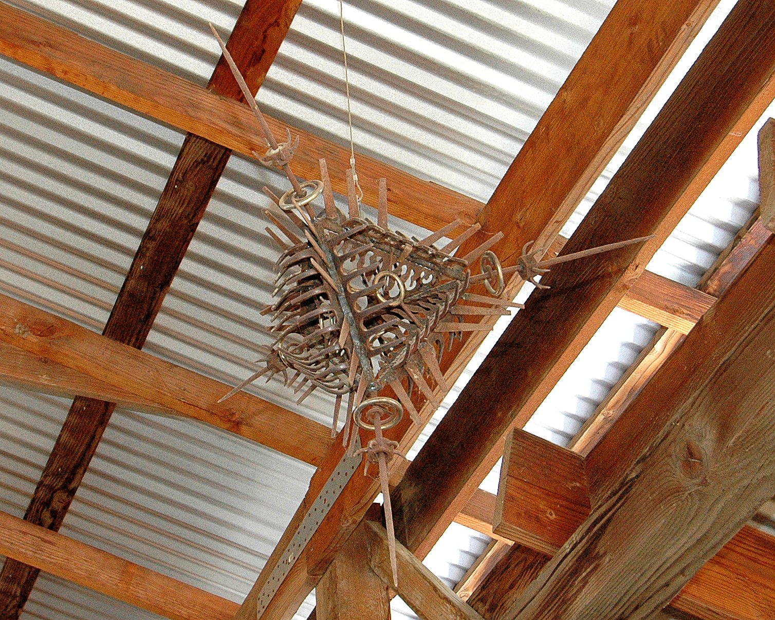 an articulated, dense, aggressive "Tetrahedron in Disguise" made of welded steel elements