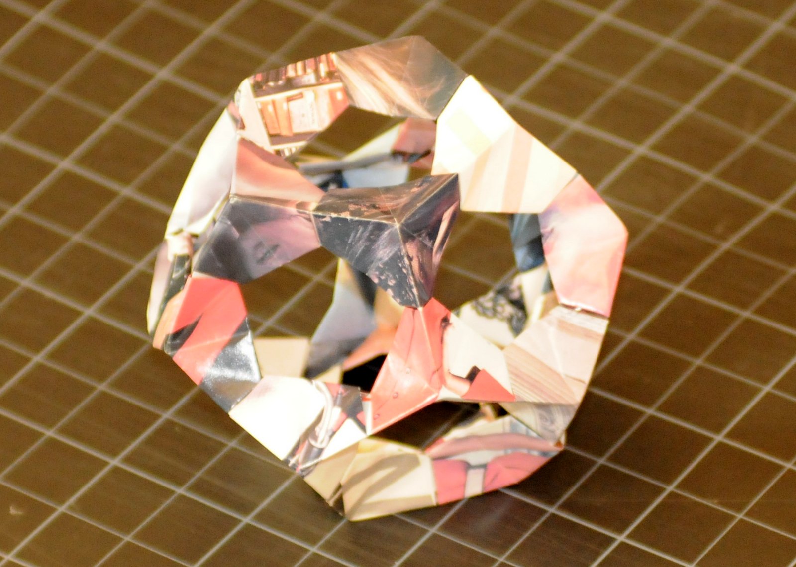 a hollow dodecahedron made of folded paper