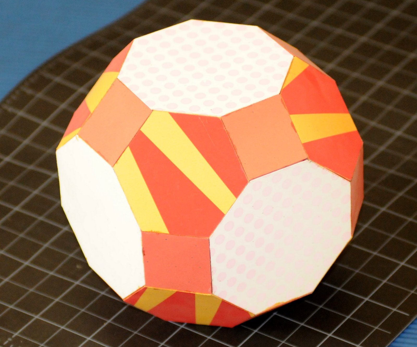 Paper model of the "Rhombitruncated Cuboctahedron" polyhedra, featuring 6 octahedron faces, 8 hexagon faces, and 12 square faces