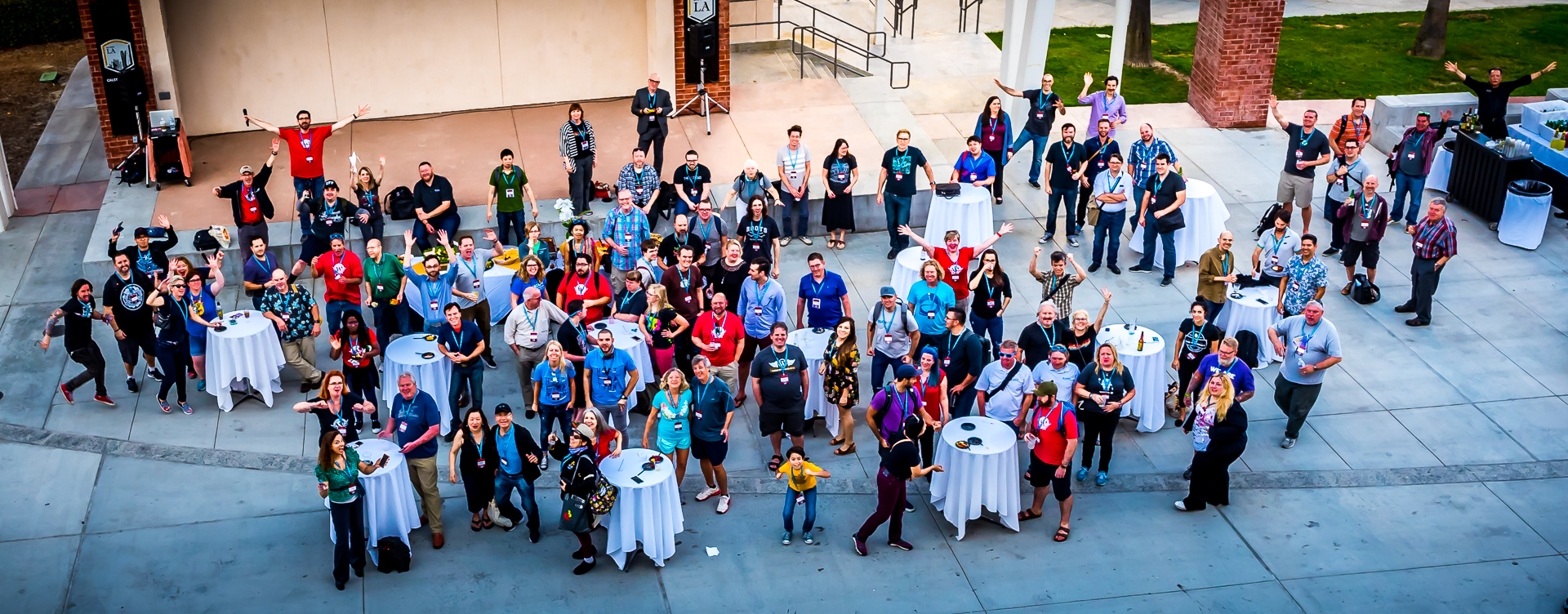 WordCamp Los Angeles 2017 attendees at the after party at Cal State LA. Wide group photo taken from a balcony above.