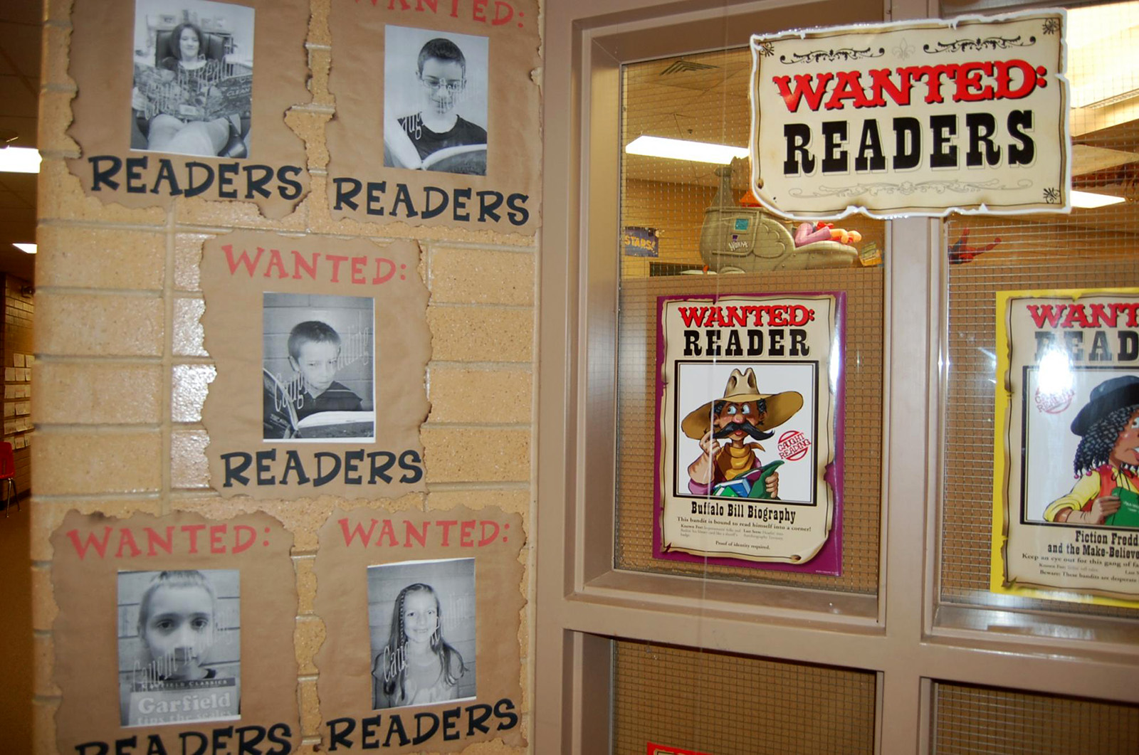 photo of school kids with banner "readers wanted"