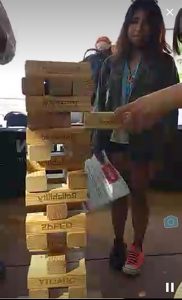 Periscope screen cap of a giant Jenga game