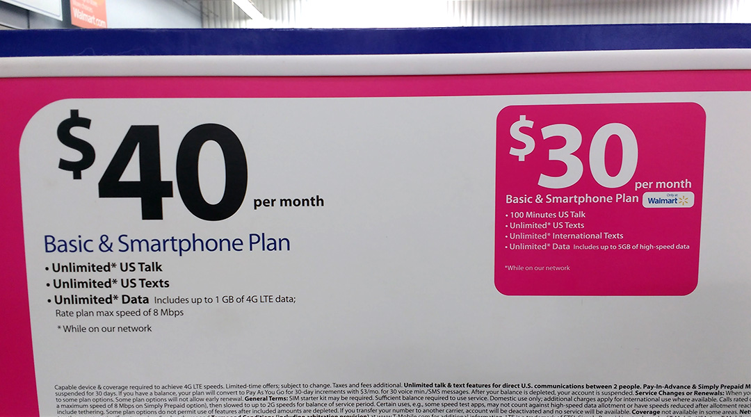Photo of a WalMart rack showing $30 and $40 plans for phone, text, and data service