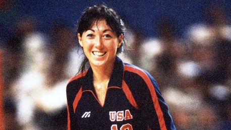 Color photo of Debbie Green-Vargas in her Team USA #10 warm-up jacket