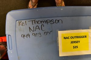 plastic storage tub with Kelly Thompson's name on it