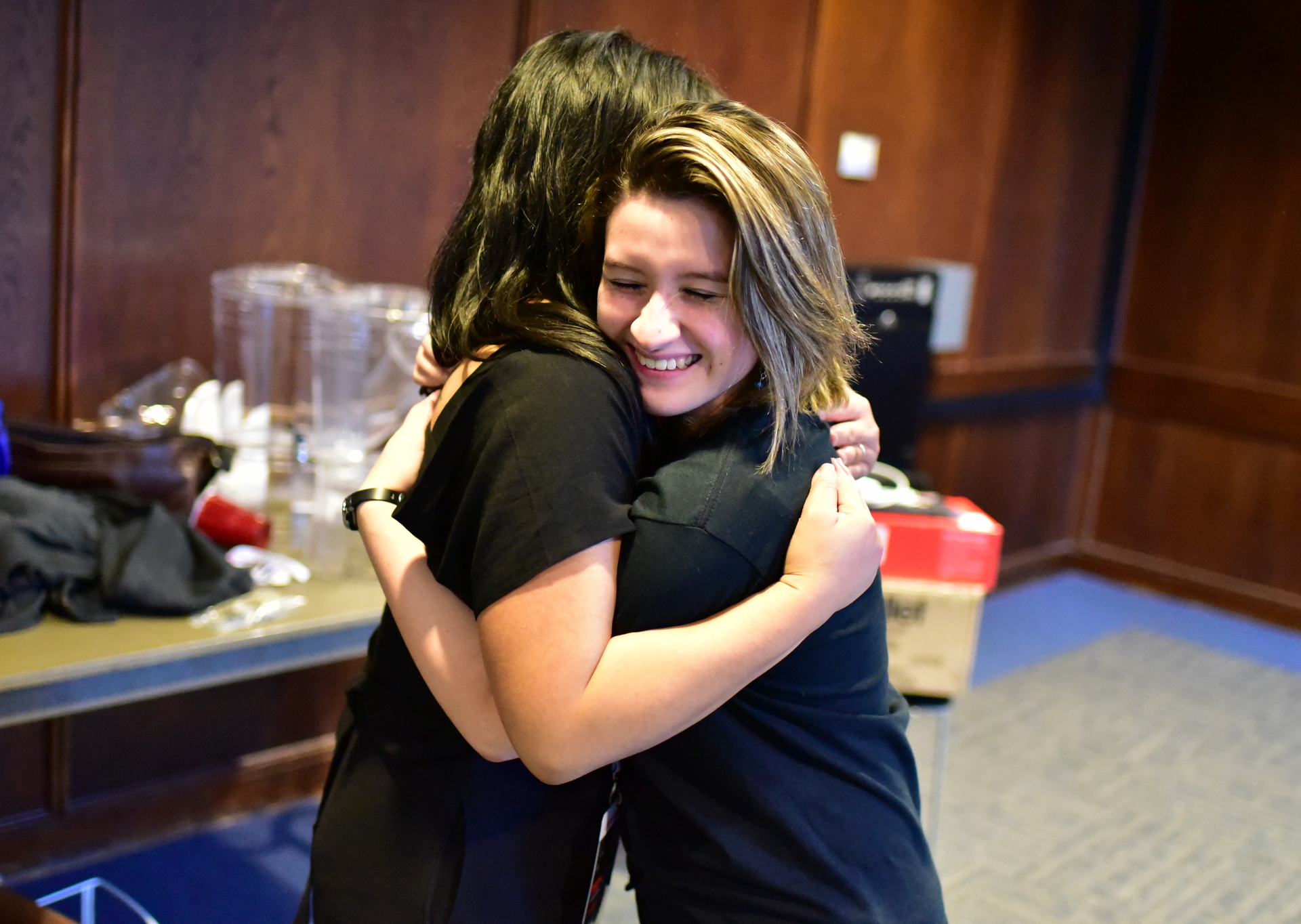 Curator Camille Raquel and Assistant-to-the-Curator Vania Arriola share a hug at the end of a long and successful TEDxCSULB 2017 event