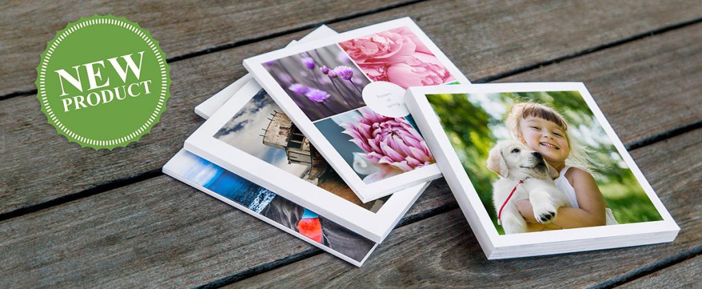 photo of several photo books on a table