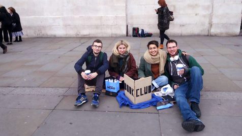 Marta Troya performing "Wandering Book Club" in the streets of London