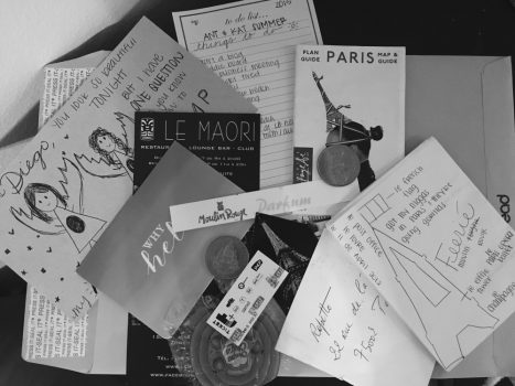 black-and-white photo of various images and bits of ephemera from Antonella to a childhood friend