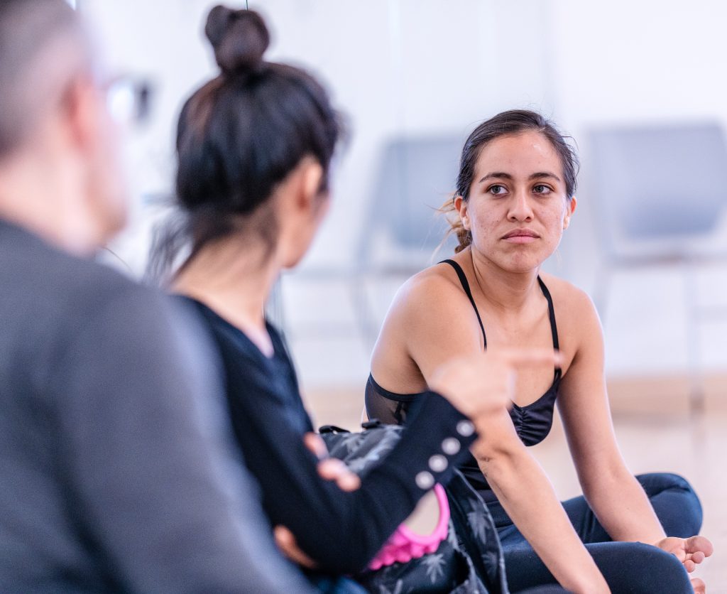 SMC Dance Faculty And Synapse Dance Theater Co-Directors Mark Tomasic And Jae Young Lee Talk With Student Choreographer Julisa Figueroa After Watching A Segment Of Her New Work For Synapse Dance Theater In SMC’s Core Performance Center On Thursday, April 25, 2019. Synapse Dance Theater Will Be Performed On The Broad Stage At SMC’s Performing Arts Center On Friday And Saturday, May 24 And 25. (Glenn Zucman/The Corsair)