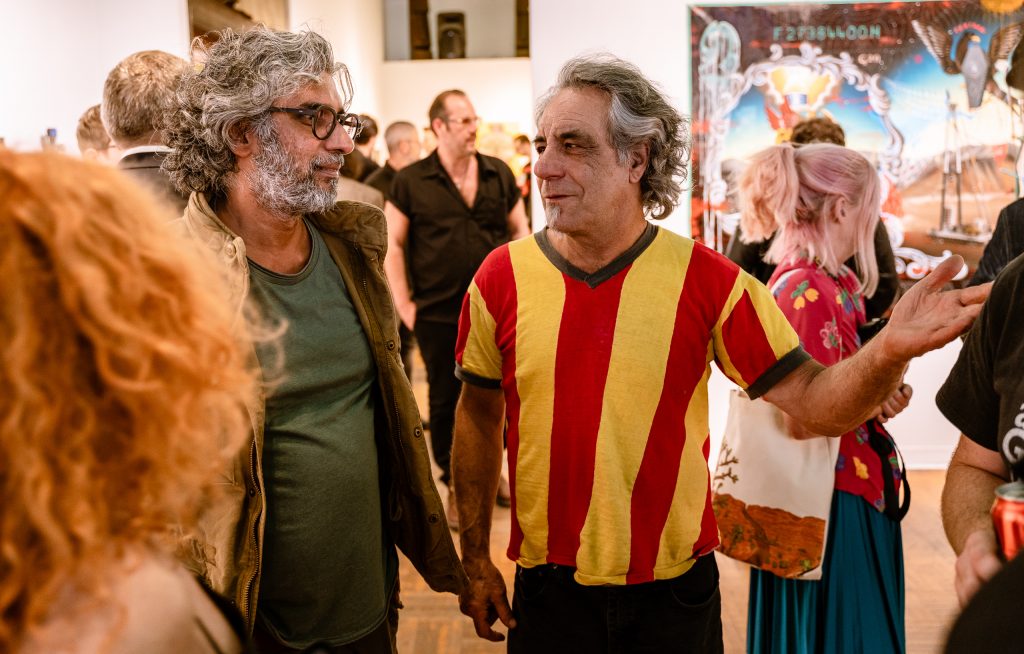 Artist Bari Kumar And Gallery Owner Billy Shire At The Opening Of In Memory Of Water And Onward At Shire's La Luz De Jesus Gallery On Hollywood Blvd. In The Los Feliz District Of Los Angeles On Friday, May 3, 2019. Two Shows Are Running At La Luz De Jesus From May 3 To June 2: Matthew Couper's Solo Exhibition In Memory Of Water, And The Group Portrait Show Onward Featuring Artists Michele Melcher, Baldur Helgason, Yeo Kaa, Valery Pobjoy, And Sung Jik Yang. (Glenn Zucman/The Corsair)